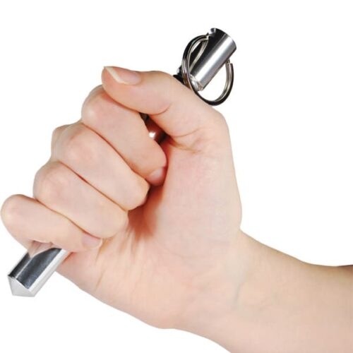 Full grip on aluminum self defense keychain Kubotan silver with fingers closed and thumb on top.